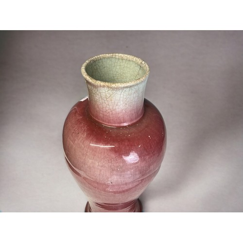 116 - A Chinese Langyao 'Peachbloom' glaze baluster vase. Qing dynasty, Kangxi period. Slender baluster fo... 