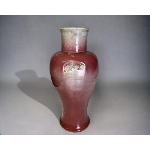 116 - A Chinese Langyao 'Peachbloom' glaze baluster vase. Qing dynasty, Kangxi period. Slender baluster fo... 