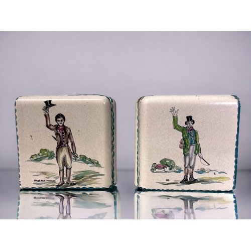 414 - A Pair of 19th Century Delft Painted Bookends.
Painted with 'Shoot' beaters signals. Triangular form... 