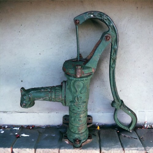 269 - A vintage French green Cast Iron Water Pump. Height -59.5cm