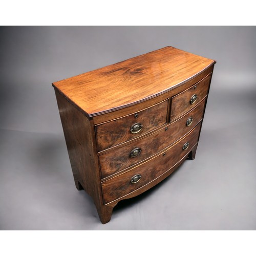 256 - An Early 19th Century 2 over 2 Mahogany Chest of drawers. Shaped swept apron with bracket feet.
Bras... 