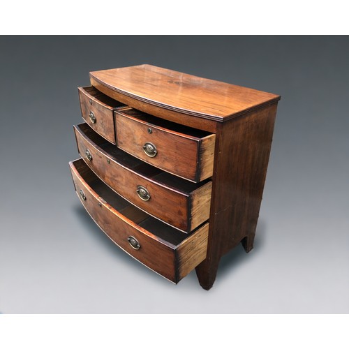 256 - An Early 19th Century 2 over 2 Mahogany Chest of drawers. Shaped swept apron with bracket feet.
Bras... 