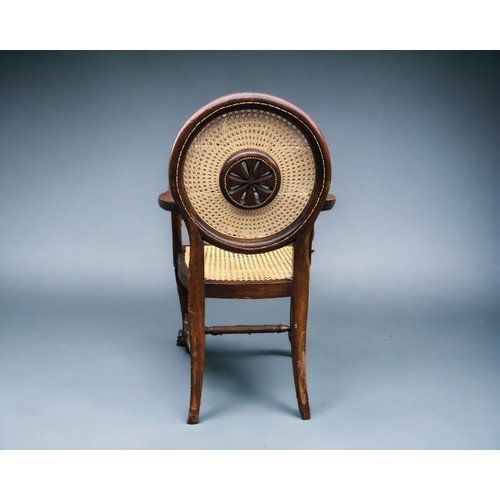 257 - An Edwardian Bergère Roundel backed bedroom Chair.
Having ball and claw feet.
In the 'Adam' style.