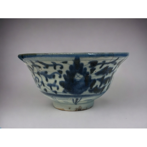 127 - Three Chinese porcelain 'Kitchen Qing' bowls.
Qing dynasty.
Blue & white painted floral patterns.