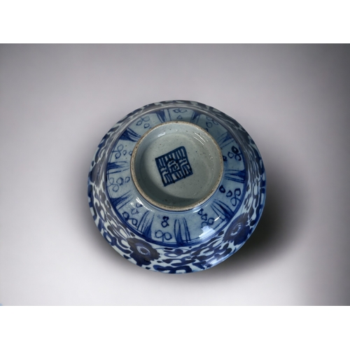 127 - Three Chinese porcelain 'Kitchen Qing' bowls.
Qing dynasty.
Blue & white painted floral patterns.