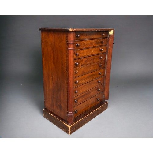 290 - A Victorian Pine Wellington chest / collectors cabinet.
With key and nine graduated drawers.
Nice tu... 