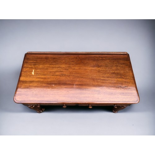 294 - A Victorian Maple & Co Mahogany writing table.
Having 2 drawers. The Right hand drawer stamped Maple... 