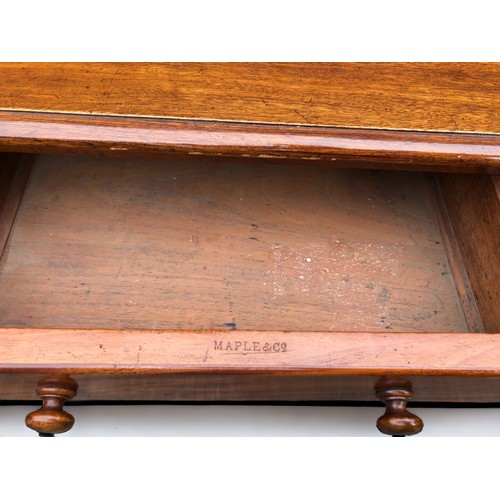 294 - A Victorian Maple & Co Mahogany writing table.
Having 2 drawers. The Right hand drawer stamped Maple... 