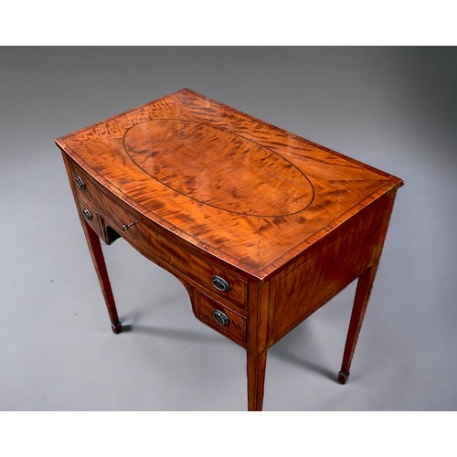 295 - A 19th Century Sheraton Style Flame Mahogany Ladies writing desk. 1 over 2 drawers supported on slen... 