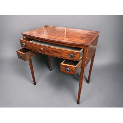 295 - A 19th Century Sheraton Style Flame Mahogany Ladies writing desk. 1 over 2 drawers supported on slen... 