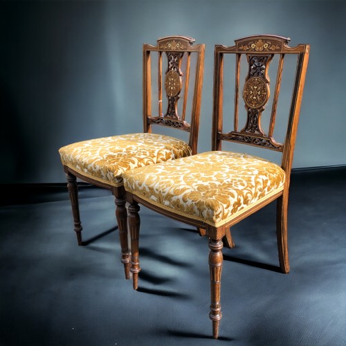 296 - Edwardian inlaid Parlour salon suite..
Including salon sofa, armchair and two chairs. All with crest... 