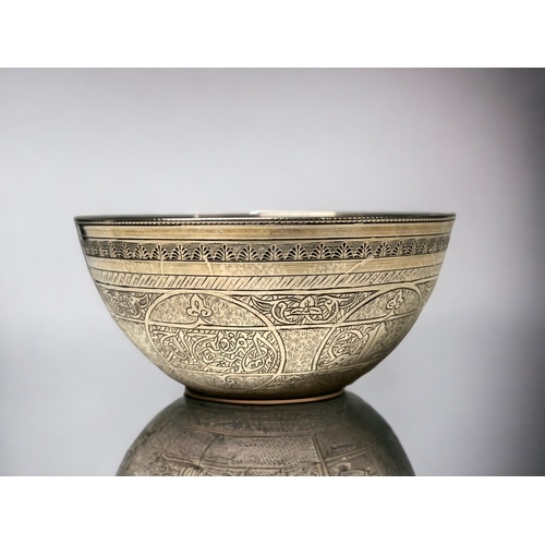 188 - A Burmese white metal finger bowl.
Engraved script and ornament.
Unmarked.