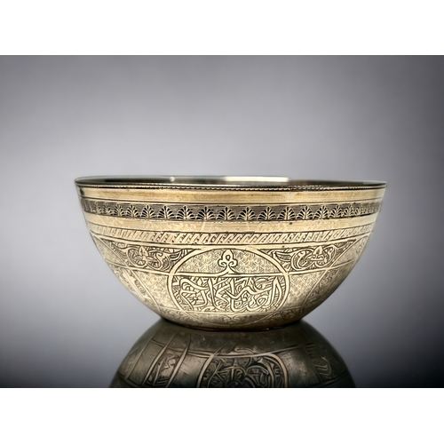 188 - A Burmese white metal finger bowl.
Engraved script and ornament.
Unmarked.