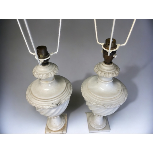 330 - A pair of vintage Italian carved Alabaster table lamps. 
Spiral baluster body on stepped base.
One s... 