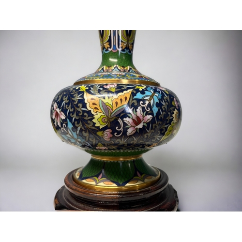 143 - A pair of good quality Chinese cloisonne vases.
Finely detailed with various Butterflies & foliate d... 