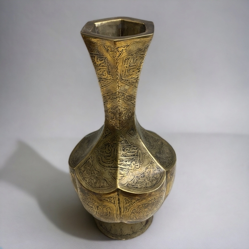 189 - A PERSIAN ARABIC BRASS HEXAGONAL VASE. 
HEIGHT - 33CM