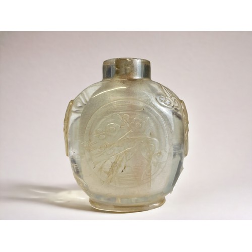 156A - A Chinese carved Rock crystal snuff bottle. Qing dynasty, 19th century. Skilfully carved roundels on... 