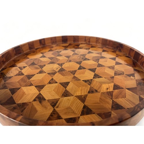 248 - A Thuya wood marquetry tray.
Diameter - 30.5cm