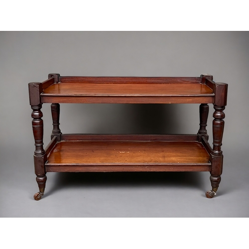 116 - A Victorian Mahogany two-tier Buffet.
Turned legs, raised on casters.