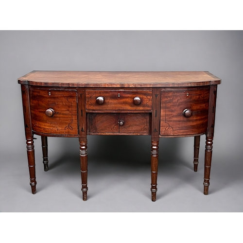 117 - A George III Bow front inlaid Mahogany sideboard. With original fitted lead wine cooler inside right... 