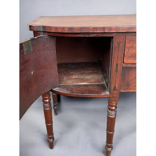 117 - A George III Bow front inlaid Mahogany sideboard. With original fitted lead wine cooler inside right... 