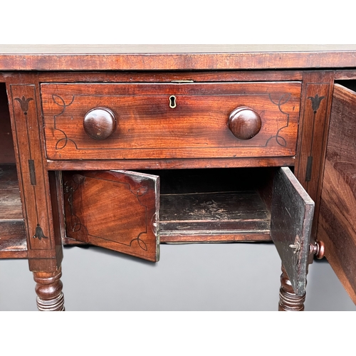 117 - A George III Bow front inlaid Mahogany sideboard. With original fitted lead wine cooler inside right... 