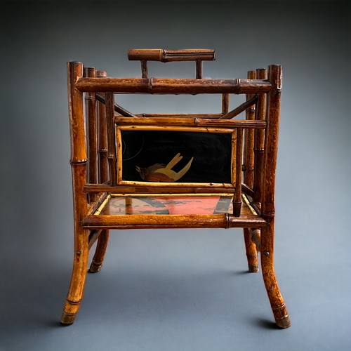 118 - A Japanese Bamboo & lacquer panelled magazine rack. Late Meiji period.