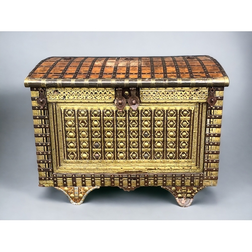 123 - A very large Syrian palace chest.Late 19th / early 20th century.Solid Walnut, mounted with hand beat... 