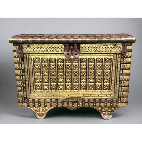 123 - A very large Syrian palace chest.Late 19th / early 20th century.Solid Walnut, mounted with hand beat... 