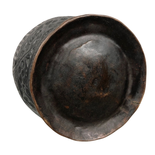 138 - Persian Metal Cup Middle Eastern Possibly 18th Century, embossed with foliate designs and kufic scri... 