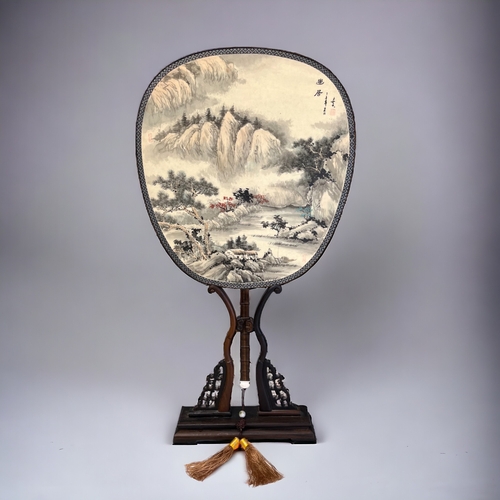 2 - A Chinese Suzhou silk fan on stand.Hand painted ink & colour landscape scene on silk, with Poem?... 