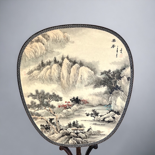 2 - A Chinese Suzhou silk fan on stand.Hand painted ink & colour landscape scene on silk, with Poem?... 