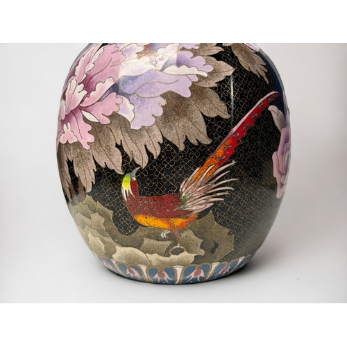 19 - A large Chinese cloisonne lidded jar.Apple shape, with large blossoms and exotic birds.Height - 25cm... 