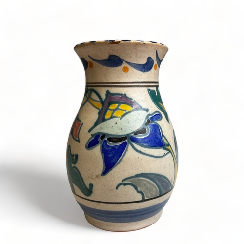 66 - A collection of hand painted Art pottery. Including a Quimper teapot, British Roskyl pottery jug and... 