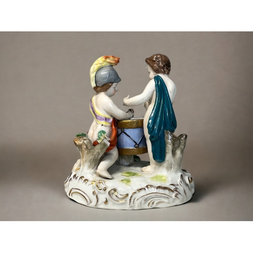 462 - A German Hochst porcelain figure group.Marked to base.Height - 15cm