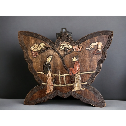 20 - A Chinese stone inlaid wooden wall plaque.Qing dynasty. Carved in the shape of a butterfly, with mea... 