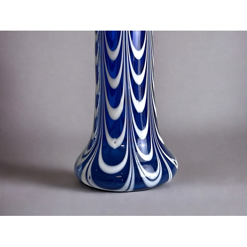 187 - A scarce Nailsea art glass vase.Circa 1900.White overlay pulled design.Height - 23cm... 