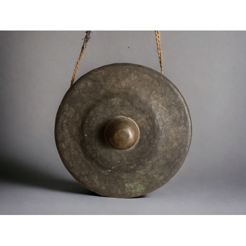 23 - A brass Tawak-Tawak Gong.Circa 1900Complete with original suspension chain.