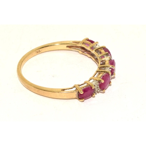 502 - 9ct gold ladies Diamond and Ruby 1/2 eternity ring hall marked diamond in ring size P