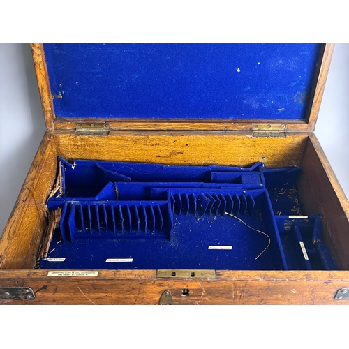 125 - A large metal bound Oak cutlery box.