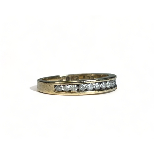 513 - A 9ct Gold and Diamonds half eternity ring. Fully hallmarked. Size - K 1/2 Approx. 2.2g