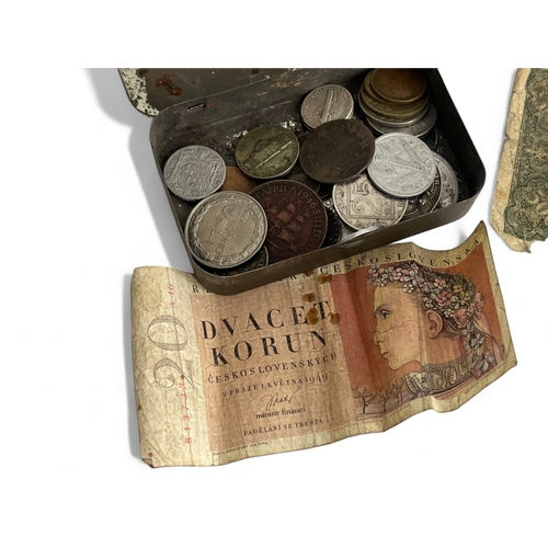 244 - A collection of Eastern European bank notes, together with a tin of mainly European coins, 19th &... 