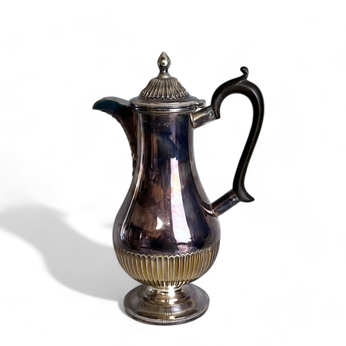 265 - Three 19th century silver plate Tea & Coffee pots. Including Walker & Hall and Hammond Creak... 