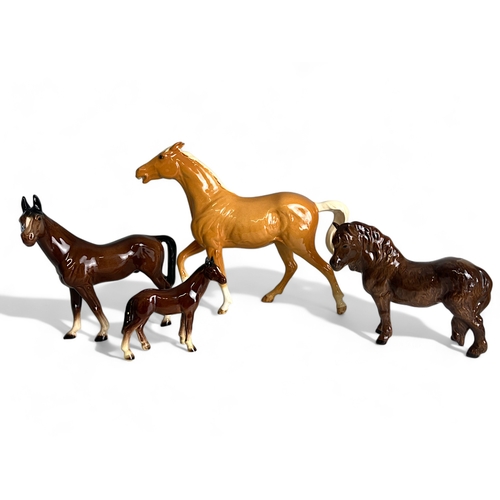 270 - A Collection of Four Bone China Horse Figures.