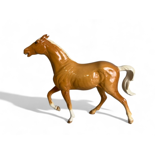 270 - A Collection of Four Bone China Horse Figures.