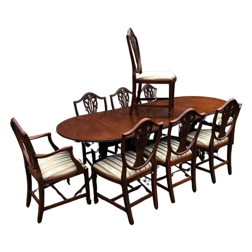 300 - Dining Room Table and 8 drop-in-seat upholstered dining chairs.