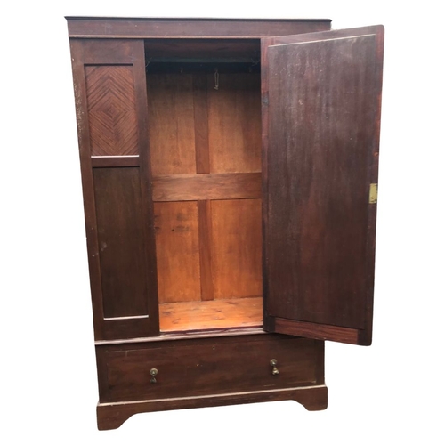 301 - Mahogany Wardrobe with central bevelled dressing mirror and drawer beneath. Approx 198cm x 119 x 45