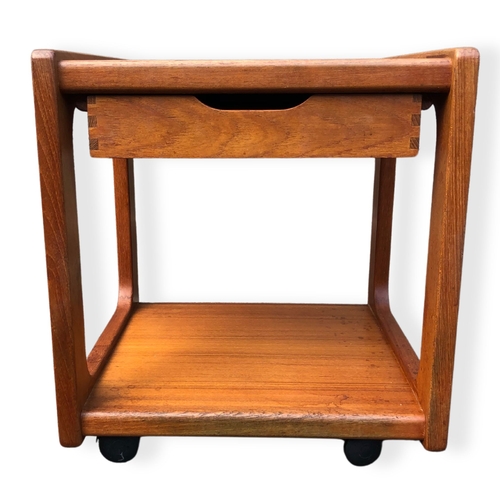 413 - Salin Nyborg Mid century modern Teak Bedside table. With single drawer on wheels.