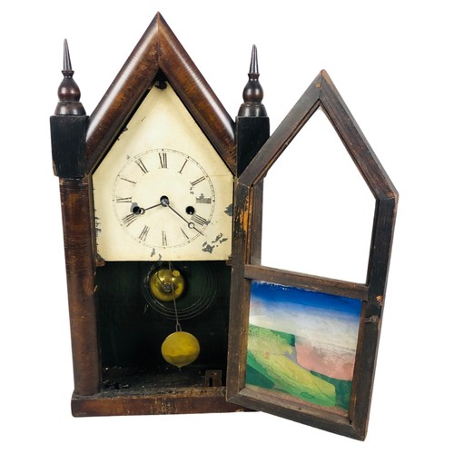 253 - 19th Century American Mantle Clock in the Gothic manner. Has Key and Pendulum and has been seen work... 