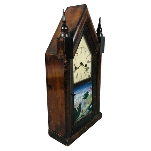 253 - 19th Century American Mantle Clock in the Gothic manner. Has Key and Pendulum and has been seen work... 